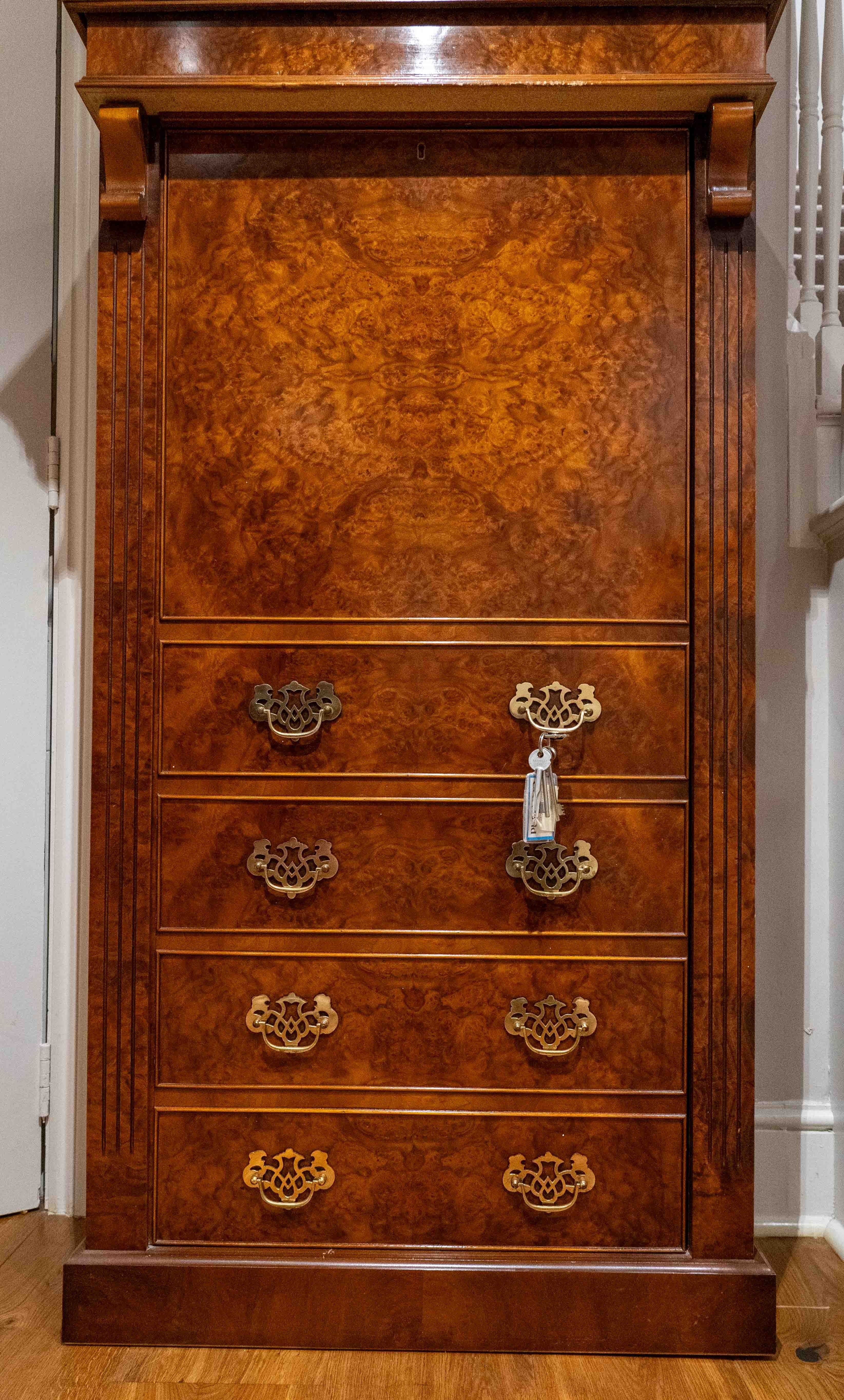 A reproduction burr walnut gun cabinet, width 84cm, depth 40cm, height 157cm. Condition - fair